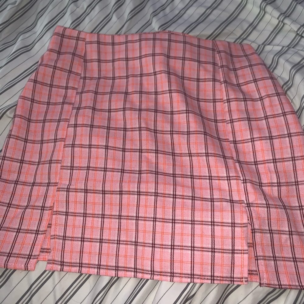 Pink plaid skirt with slits